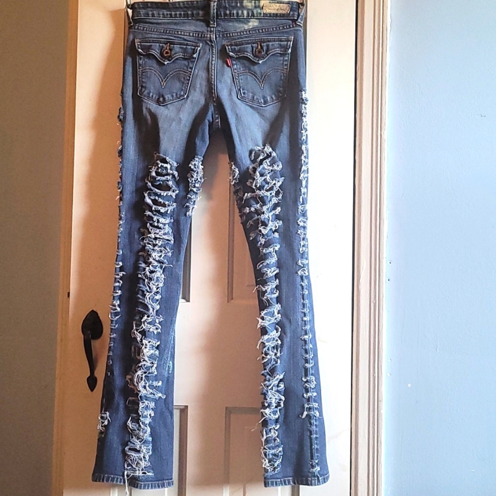 Levi Jeans Size 4 Boot cut Distressed Super cool